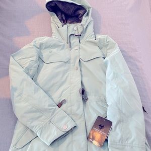 Women’s turquoise Obermeyer Ski Jacket. New, comes with tags still on.